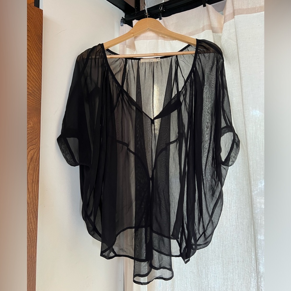 Sheer Black billowy blouse by Lush xs/s